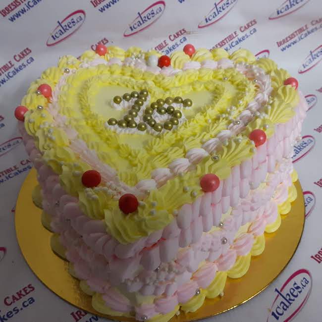 Sweet sixteen heart shaped vintage buttercream cake