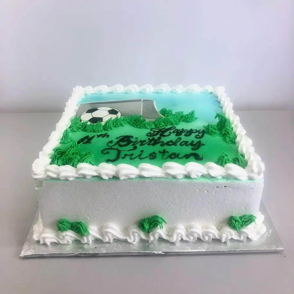 Soccer sports kids birthday buttercream cake from Irresistible Cakes