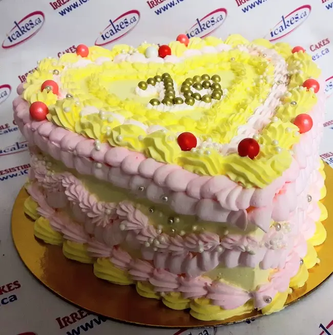 Sweet sixteen heart shaped vintage buttercream cake